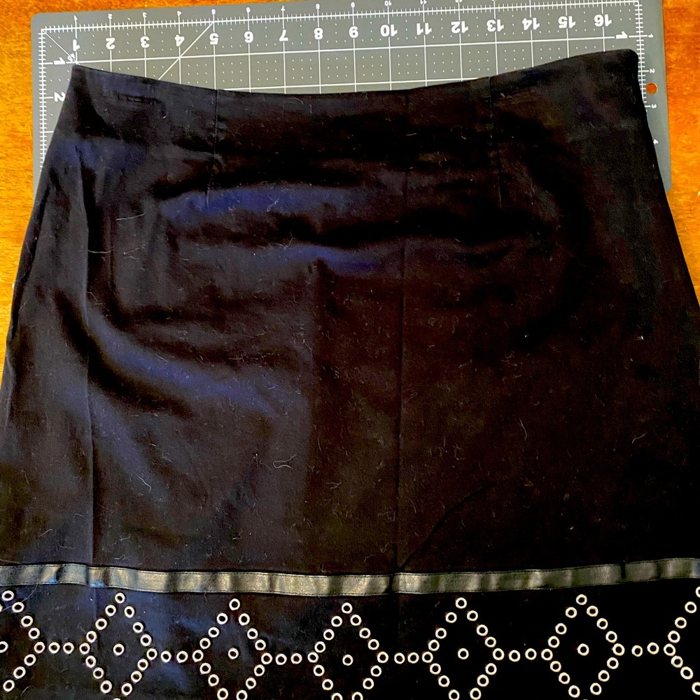 Black skirt with metal embroidery